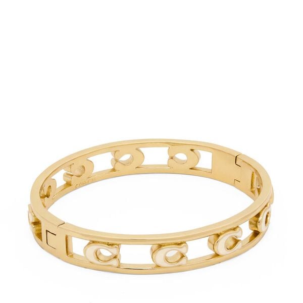 Bransoletka Coach. Żółte bransoletki Coach, złote. Za 479.99 zł.