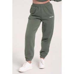 Spodnie fitness damskie Gym Glamour dresowe. Brązowe spodnie dresowe GYM GLAMOUR, m, bez wzorów, z dresówki, na fitness i siłownię. Za 189.99 zł.