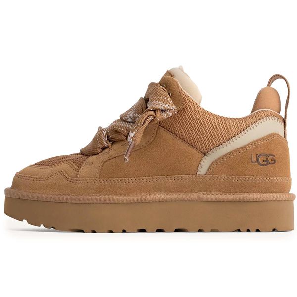 Kapcie UGG Lowmel w kolorze chestnut. Brązowe obuwie domowe UGG, bez wzorów, z materiału, bez zapięcia. Za 876.75 zł.