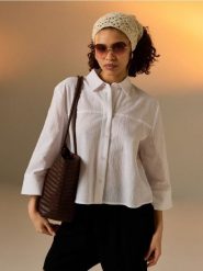 Bawełniana koszula z rękawem 3/4 - biały. Białe koszule Sinsay, l, bez wzorów, z bawełny, bez kołnierzyka, bez ramiączek. Za 49.99 zł.