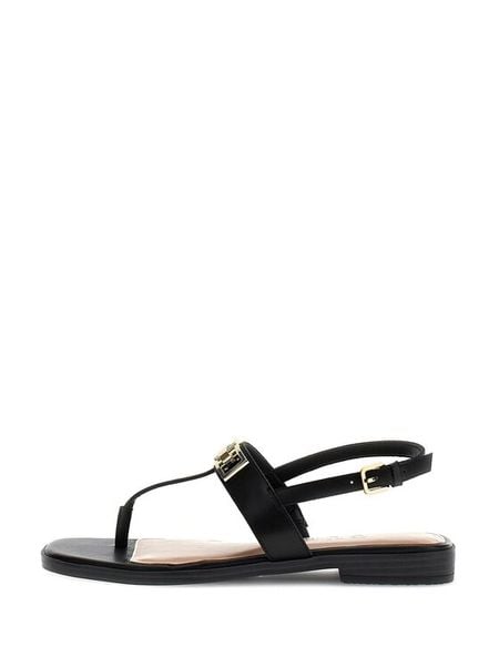 Guess Sandały FLJRMY LEA03 Czarny. Czarne sandały Guess, z aplikacjami, ze skóry, bez obcasa, na płaskiej podeszwie, bez zapięcia. Za 274.99 zł.