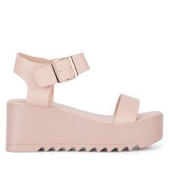 Sandały JENNY. Brązowe sandały Jenny, bez wzorów, bez obcasa, na koturnie, bez zapięcia. Za 139.99 zł.