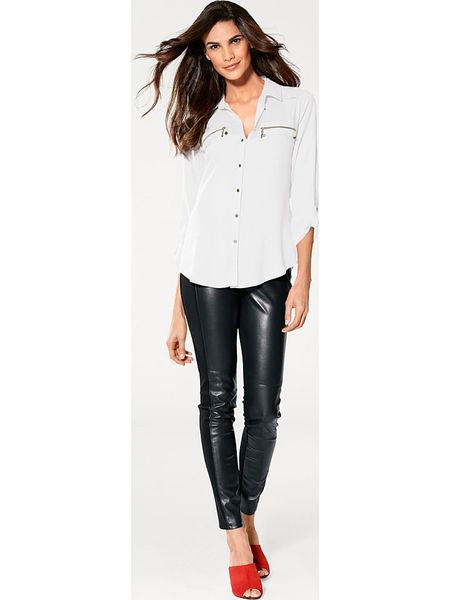 Heine Bluzka w kolorze białym rozmiar: 38. Białe bluzki Heine, bez wzorów, z wiskozy, bez kołnierzyka, bez ramiączek. Za 56.79 zł.