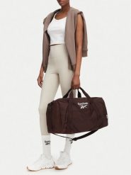 Reebok Torba sportowa CWBEO-RBK-B-001-08 Brązowy ciemny. Brązowe torebki klasyczne Reebok, bez wzorów, z materiału, bez dodatków. Za 129.99 zł.