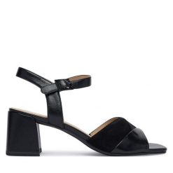 Sandały Caprice. Czarne sandały Caprice, bez wzorów, bez obcasa, na słupku, bez zapięcia. Za 329.99 zł.