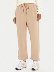 United Colors Of Benetton Spodnie dresowe 3PKLDF016 Beżowy Relaxed Fit. Brązowe spodnie dresowe United Colors of Benetton, xl, bez wzorów, z dresówki. Za 139.99 zł.