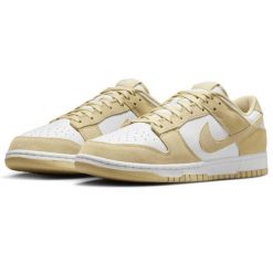 Buty sportowe Nike Dunk LOW RETRO. Żółte obuwie sportowe Nike, bez zapięcia, trekkingowe. Za 454.50 zł.