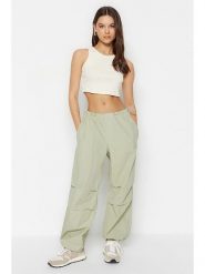 Trendyol Spodnie w kolorze jasnozielonym rozmiar: 34. Zielone spodnie materiałowe Trendyol, bez wzorów, z bawełny, z podwyższonym stanem. Za 61.75 zł.