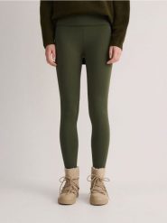 Legginsy z wysokim stanem - ciemnozielony. Zielone legginsy Reserved, l, bez wzorów, z dzianiny, z podwyższonym stanem. W wyprzedaży za 39.99 zł.