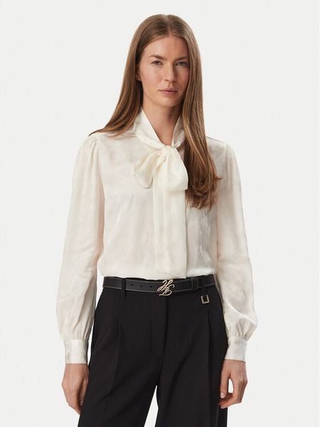 Tommy Hilfiger Bluzka WW0WW52238 Kremowy Regular Fit. Białe bluzki TOMMY HILFIGER, bez wzorów, z wiskozy, bez kołnierzyka, bez ramiączek. Za 649.99 zł.