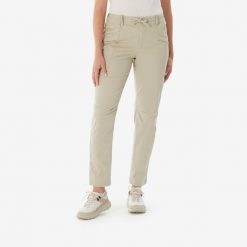 Spodnie turystyczne damskie Quechua NH500 Regular. Brązowe spodnie sportowe QUECHUA, na lato, xs, bez wzorów, z elastanu, trekkingowe. Za 119.99 zł.