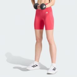 Krótkie legginsy Optimé Essentials Stash Pocket 7-Inch. Zielone legginsy Adidas, xs, bez wzorów, z elastanu, z podwyższonym stanem, krótkie. Za 149.00 zł.