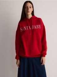 Bluza ze świątecznym motywem - czerwony. Czerwone bluzy Reserved, l, bez wzorów, z bawełny, bez kaptura. W wyprzedaży za 49.99 zł.