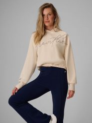 4F Bluza dresowa regular z kapturem damska - kremowa XL. Brązowe bluzy 4f, xl, z aplikacjami, z dresówki, z kapturem. Za 159.99 zł.