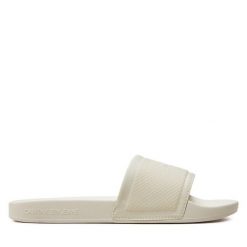 Klapki Calvin Klein Jeans. Białe klapki Calvin Klein Jeans, bez wzorów, z jeansu, bez obcasa. Za 219.99 zł.