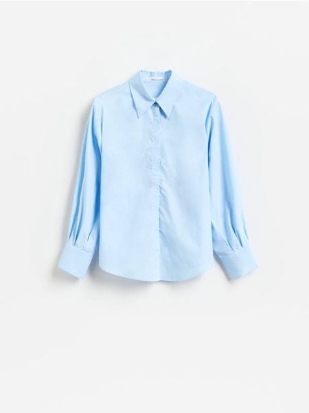 Bawełniana koszula - jasnoniebieski. Niebieskie koszule Reserved, l, bez wzorów, z bawełny, bez kołnierzyka, bez ramiączek. Za 129.99 zł.