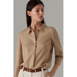 Koszula w stylu safari z lyocellu - Beżowy. Brązowe koszule Mohito, bez wzorów, z lyocellu, bez kołnierzyka, bez ramiączek. Za 119.99 zł.
