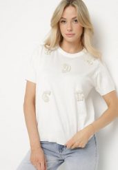 Biały T-shirt Ozdobiony Naszywkami Perełkami i Cyrkoniami Karavia. Białe t-shirty Born2be, uniwersalny, z aplikacjami, z jeansu, bez kołnierzyka, bez ramiączek. Za 89.99 zł.