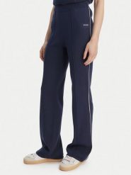 Guess Spodnie dzianinowe V6RB14 Z4642 Granatowy Regular Fit. Niebieskie spodnie materiałowe Guess, xl, z aplikacjami, z dzianiny. Za 524.99 zł.