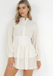 Beżowa Sukienka Mini z Falbaną i Guzikami Othia. Brązowe sukienki Born2be, na lato, l, bez wzorów, z materiału, bez kołnierzyka, bez ramiączek, mini. Za 119.99 zł.