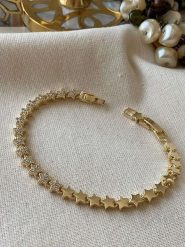 Luseera Pozłacana bransoletka z cyrkoniami rozmiar: onesize. Żółte bransoletki Luseera, z cyrkonią, pozłacane. Za 65.99 zł.