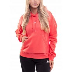 Damska bluza adidas Essentials Small Logo Feel Cozy Hoodie koralowa. Pomarańczowe bluzy Adidas, bez wzorów, z bawełny, bez kaptura. Za 218.45 zł.