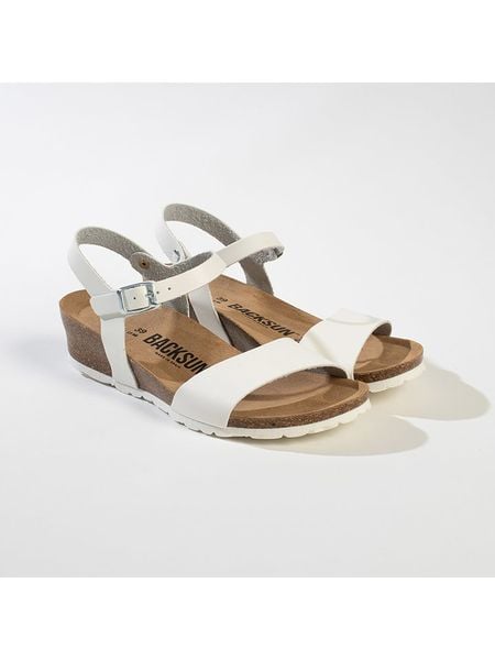 BACKSUN Skórzane sandały w kolorze białym na koturnie rozmiar: 38. Białe sandały Backsun, bez wzorów, z materiału, z otwartym noskiem, bez obcasa, na koturnie, bez zapięcia. Za 163.26 zł.