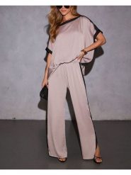 Milan Kiss Spodnie w kolorze beżowym rozmiar: M. Brązowe spodnie materiałowe Milan Kiss, m, bez wzorów, z materiału. Za 130.99 zł.