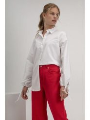 Josephine & Co Bluzka w kolorze białym rozmiar: 38. Białe bluzki Josephine & Co, bez wzorów, z bawełny, bez kołnierzyka, bez ramiączek. Za 123.25 zł.