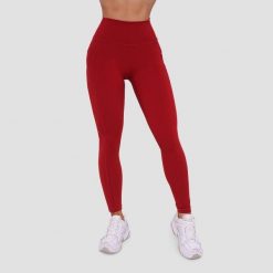 Legginsy damskie fitness z kieszeniami ciemnoczerwone Ignite. Czerwone legginsy GYMBEAM, m, bez wzorów, z elastanu. Za 112.90 zł.