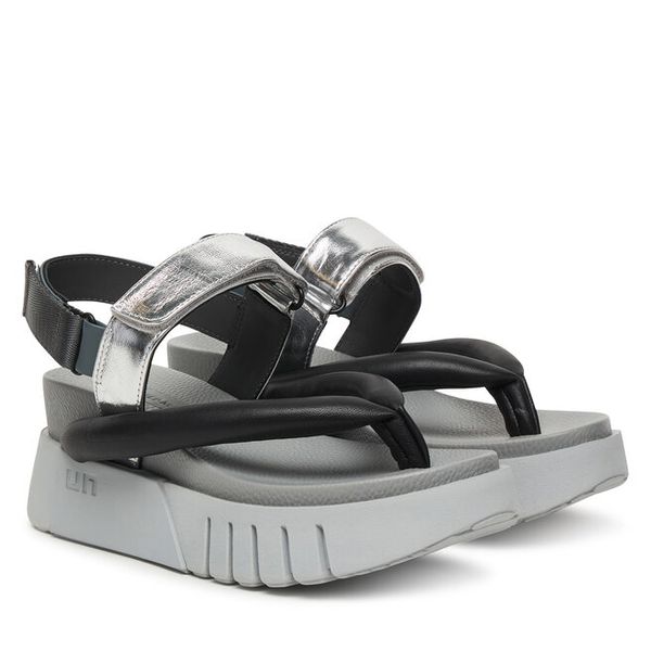 Sandały United Nude. Szare sandały United Nude, bez wzorów, bez obcasa, na koturnie, bez zapięcia. Za 1,051.99 zł.