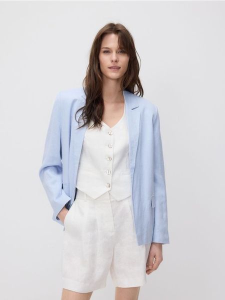 Marynarka z dodatkiem lnu - jasnoniebieski. Niebieskie marynarki i żakiety Reserved, l, bez wzorów, z wiskozy. W wyprzedaży za 59.99 zł.