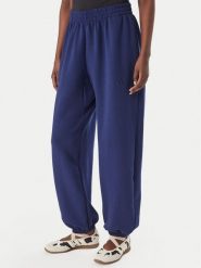 Adidas Spodnie dresowe Soft Lux KS7879 Niebieski Loose Fit. Niebieskie spodnie dresowe Adidas, l, bez wzorów, z dresówki. Za 329.99 zł.