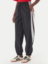 Adidas Spodnie dresowe Sport Santiago KC9116 Czarny Loose Fit. Czarne spodnie dresowe Adidas, s, bez wzorów, z dresówki. Za 349.99 zł.