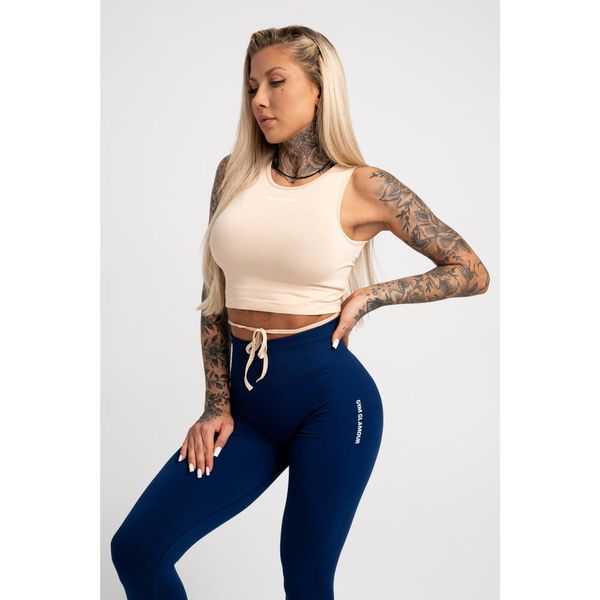 Top fitness damski Gym Glamour wiązany. Brązowe koszulki sportowe GYM GLAMOUR, s, bez wzorów, bez kołnierzyka, bez ramiączek. Za 99.99 zł.