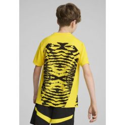 Młodzieżowa koszulka przedmeczowa z krótkim rękawem Borussia Dortmund PUMA. Czarna bluzki Puma, m, bez wzorów, młodzieżowe, bez kołnierzyka, bez ramiączek. W wyprzedaży za 219.00 zł.
