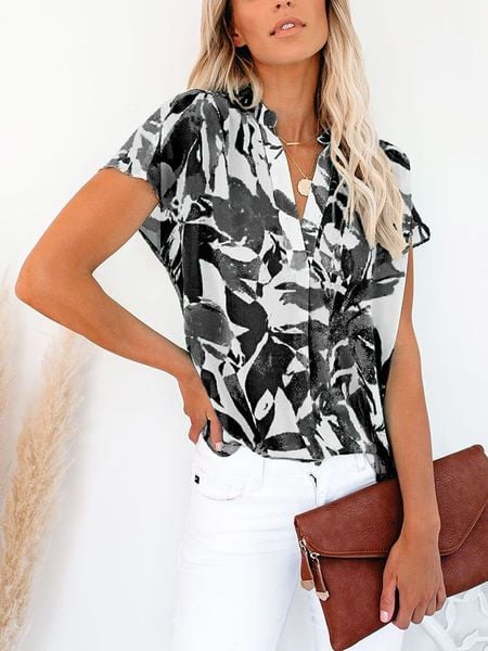 Milan Kiss Bluzka w kolorze czarno-białym rozmiar: S. Czarne bluzki Milan Kiss, s, bez wzorów, bez kołnierzyka, bez ramiączek. Za 105.14 zł.