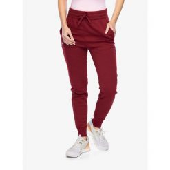 Spodnie damskie Under Armour Rival Fleece Joggers. Czerwone spodnie sportowe Under Armour, xs, bez wzorów, trekkingowe. Za 172.99 zł.