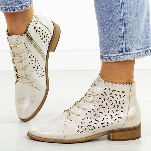 Złote ażurowe botki damskie Potocki 12646. Żółte botki POTOCKI, na jesień, w ażurowe wzory, z jeansu, bez obcasa, na płaskiej podeszwie, bez zapięcia. Za 229.00 zł.