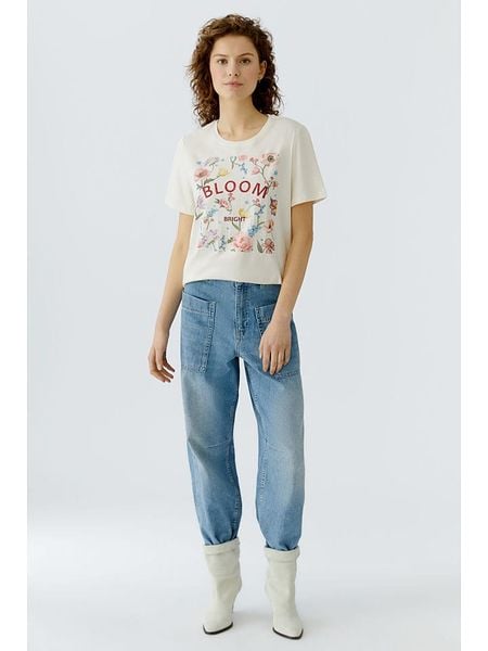 Oui Koszulka w kolorze kremowym ze wzorem rozmiar: 46. Brązowe bluzki Oui, bez wzorów, z bawełny, bez kołnierzyka, bez ramiączek. Za 129.95 zł.