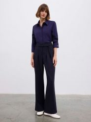 BGN Spodnie w kolorze granatowym rozmiar: 40. Niebieskie spodnie materiałowe BGN, na co dzień, bez wzorów, z materiału. Za 100.99 zł.