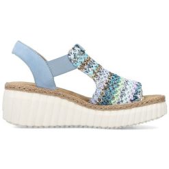Sandały damskie RIEKER skórzana wkładka niebieskie. Niebieskie sandały bez wzorów, ze skóry ekologicznej, eleganckie, bez obcasa, na obcasie, bez zapięcia. Za 498.94 zł.