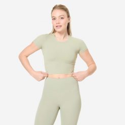 Koszulka do jogi i pilatesu Breathe. Zielone bluzki DOMYOS, l, bez wzorów, z elastanu, sportowe, bez kołnierzyka, bez ramiączek. W wyprzedaży za 49.99 zł.