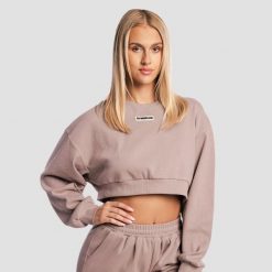 Bluza damska krótka bez kaptura rdzawa Aura. Brązowe bluzy GYMBEAM, m, bez wzorów, z bawełny, bez kaptura. Za 118.90 zł.
