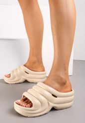 Beżowe Designerskie Gumowe Klapki z Okrągłym Noskiem Vilnira. Brązowe klapki Renee, w ażurowe wzory, z gumy, z okrągłym noskiem, bez obcasa. Za 19.99 zł.
