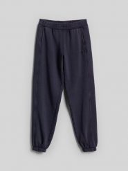 4F Spodnie dresowe joggery damskie - granatowe XS. Niebieskie spodnie dresowe 4f, xs, bez wzorów, z bawełny. Za 149.99 zł.