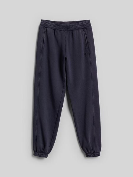 4F Spodnie dresowe joggery damskie - granatowe XS. Niebieskie spodnie dresowe 4f, xs, bez wzorów, z bawełny. Za 149.99 zł.