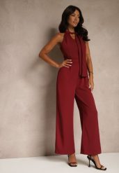 Bordowy Kombinezon Wide Leg z Ozdobnym Wiązaniem przy Szyi Silelia. Czerwone sukienki Renee, na co dzień, l, bez wzorów, eleganckie, bez kołnierzyka, bez ramiączek, kopertowe. Za 99.99 zł.