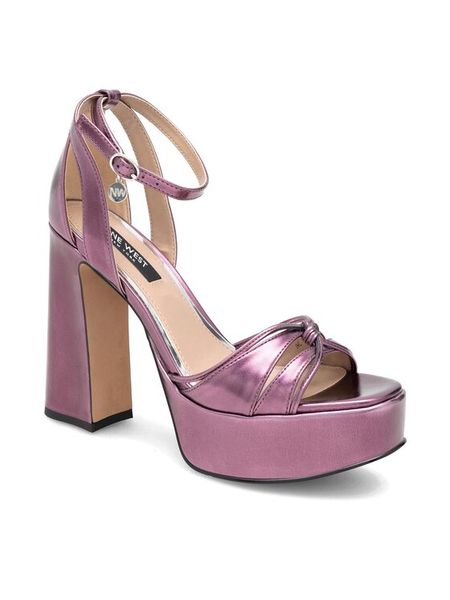 Nine West Sandały Aahida ZL23002CC Fioletowy. Fioletowe sandały Nine West, bez wzorów, ze skóry, bez obcasa, na słupku, bez zapięcia. Za 199.99 zł.