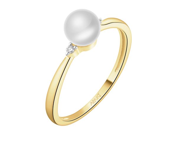 Pierścionek z żółtego złota z brylantami i perłą - próba 375. Żółte pierścionki Apart, z brylantem, złote. Za 1,259.00 zł.